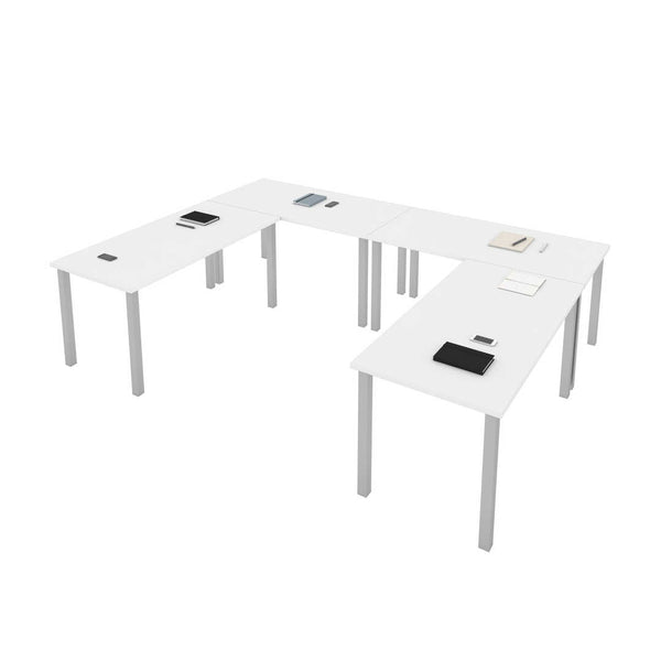 Quatre tables de bureau 60L x 30P avec pattes carrées en métal